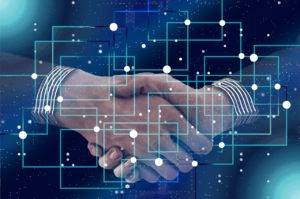 blockchain people shaking hands 2850276 300x199 - Publicaciones
